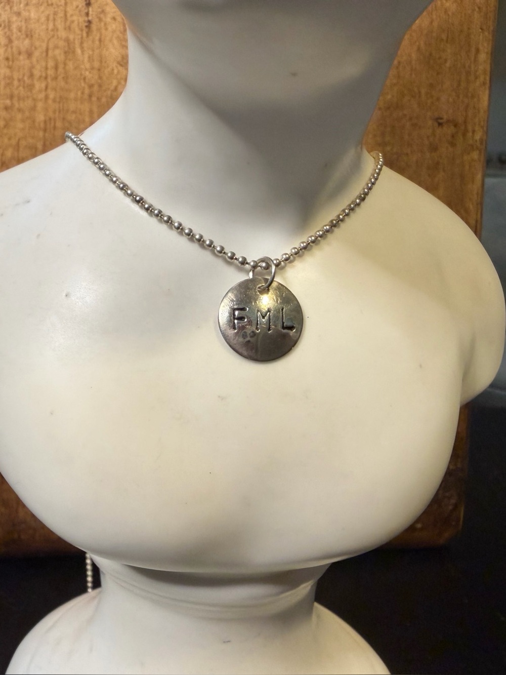 Stamped “FML” Necklace. 16”.